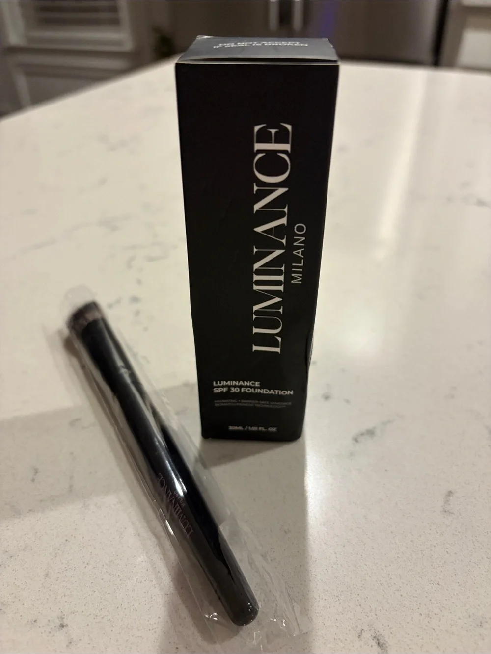 NWT Luminance SPF 30 Foundation, light color with brand new brush.